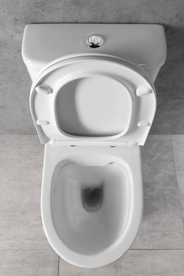 DARIO RIMLESS kompakt WC, odpływ poziomy/pionowy